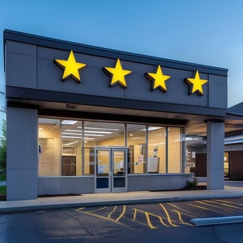 The outside of a medical office building shows a figure inside and four stars on the building.