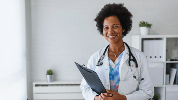 Woman physician holding a patient chart 